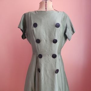 Very chic green and yellow scarf. Pair with a simp